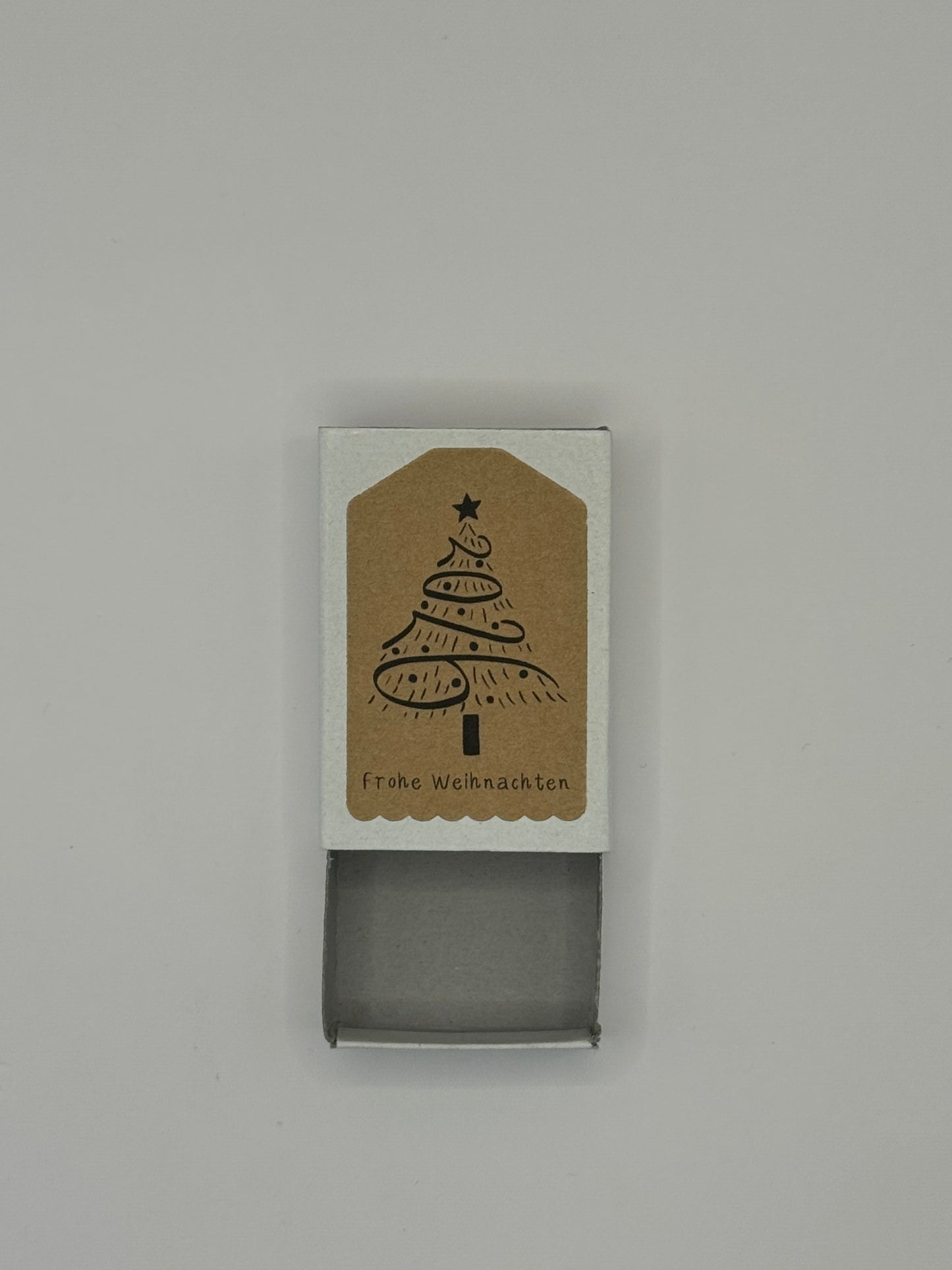 Zündholzschachtel „Frohe Weihnachten“